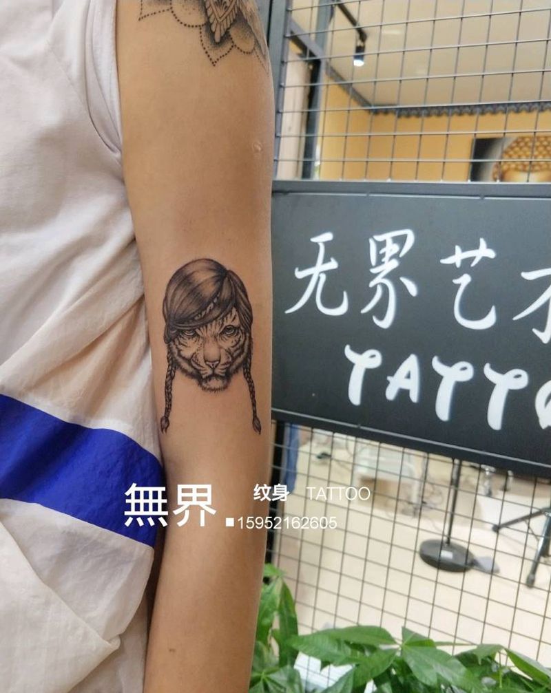 虎妞纹身图片_手臂欧美写实动物原创素描老虎成品纹身图案