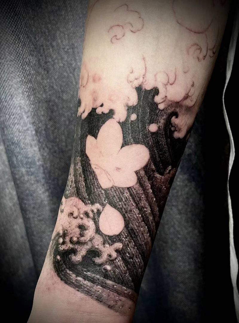 石雕水浪纹身图片_手臂欧美写实纹身图案