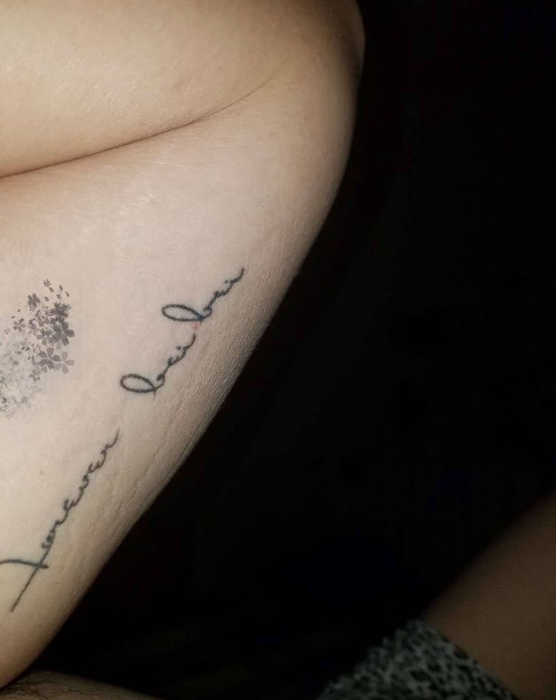 羽毛遮盖纹身图片