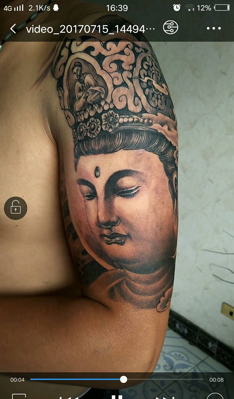 佛祖笑了纹身图片_手臂传统宗教成品纹身图案