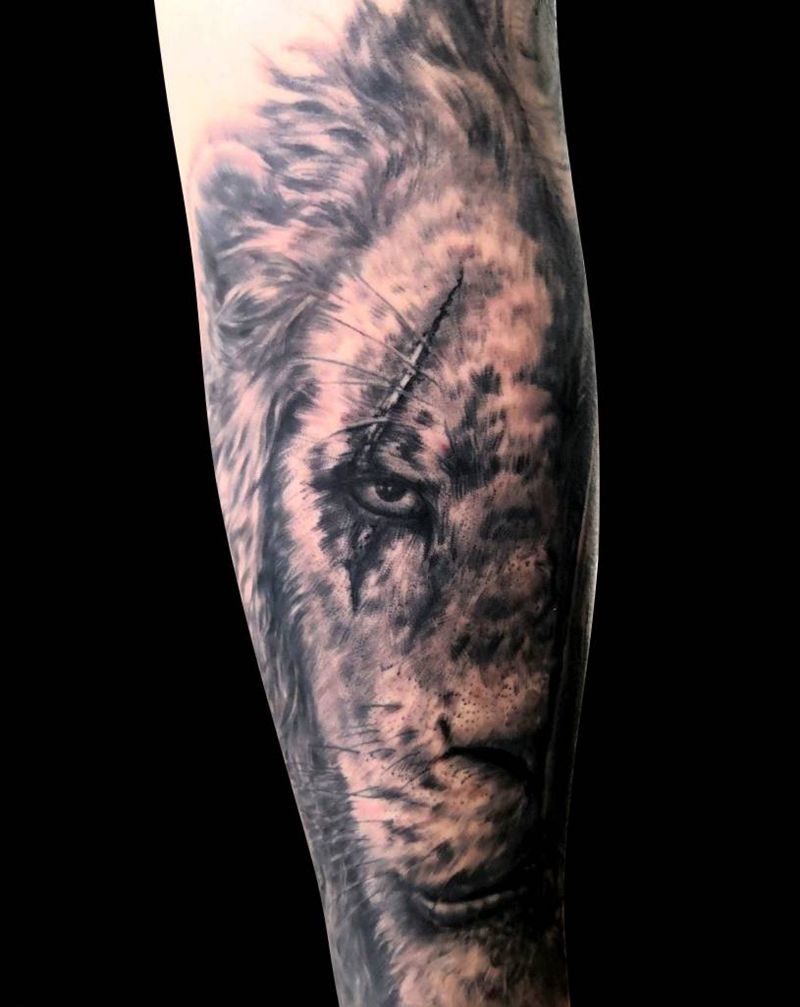 狮子王写实刀疤纹身图片_手臂欧美写实纹身图案