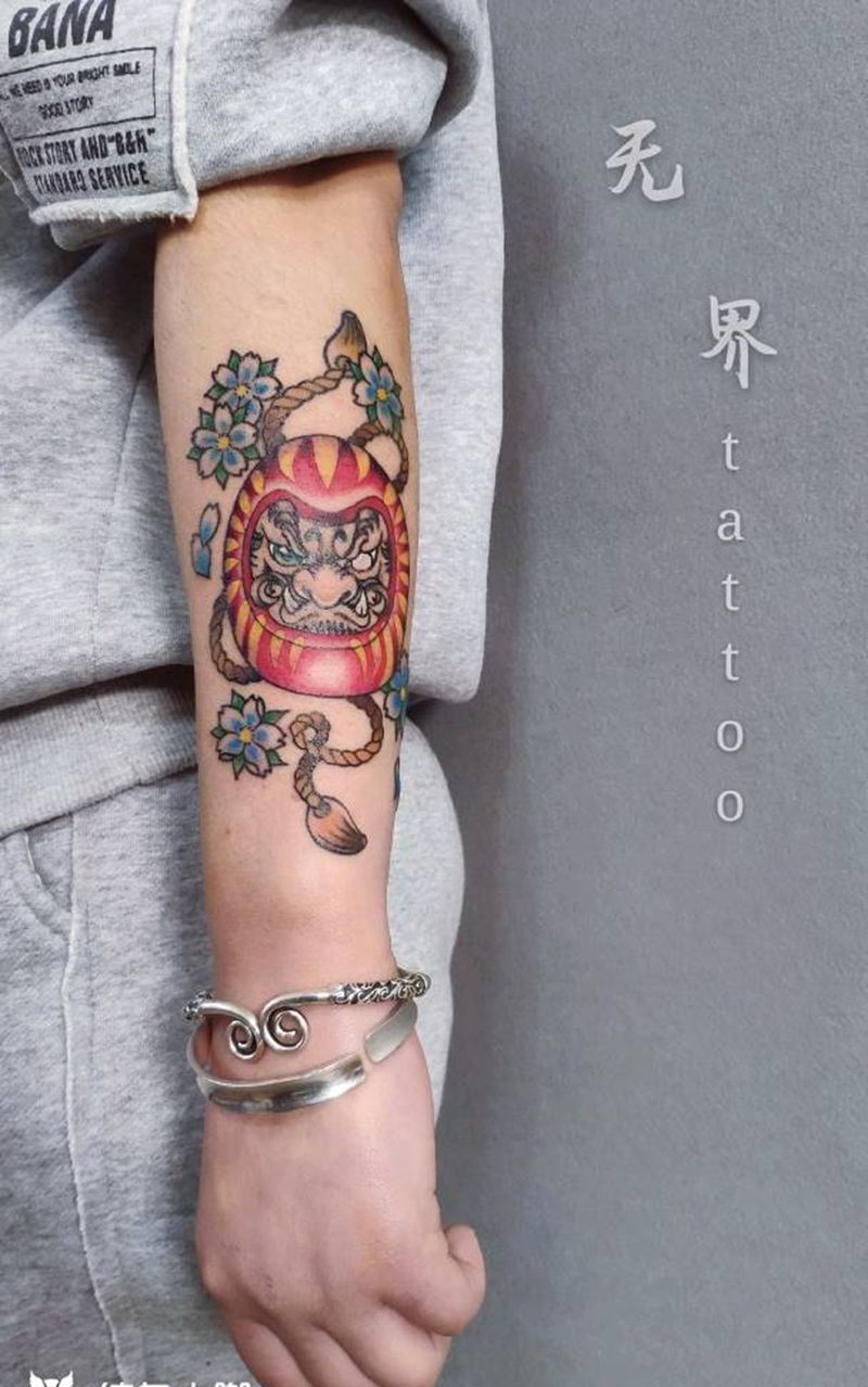 达摩蛋纹身图片_手臂Old SchoolNew School达摩蛋纹身图案