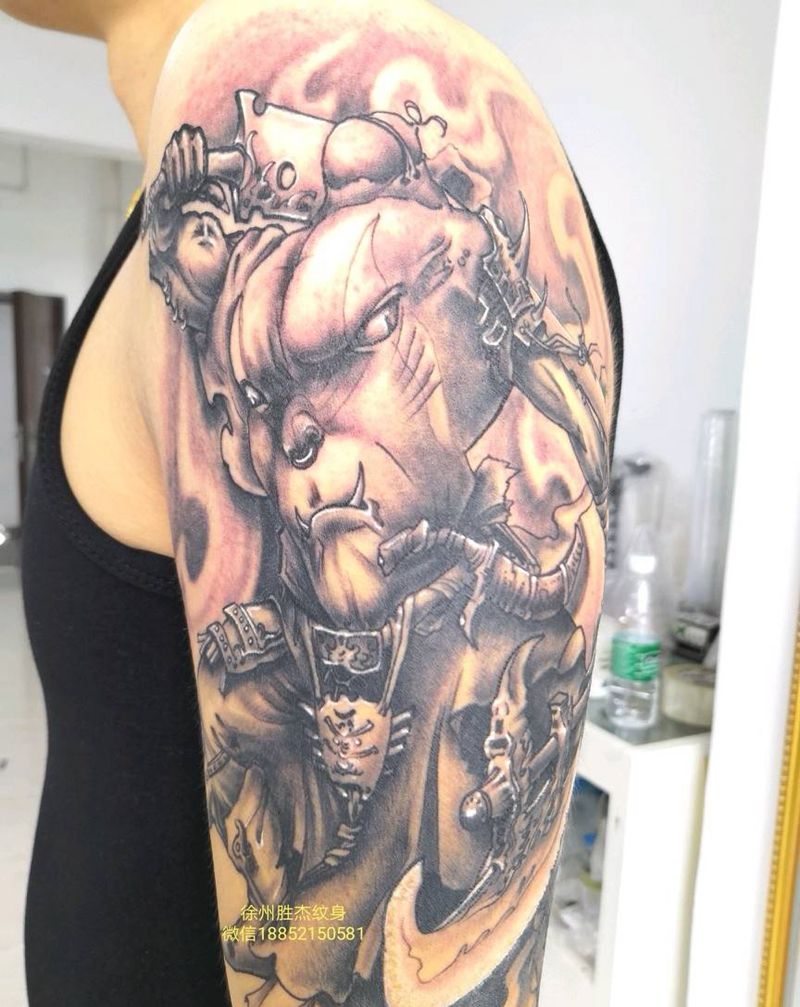 大臂刑天纹身图片