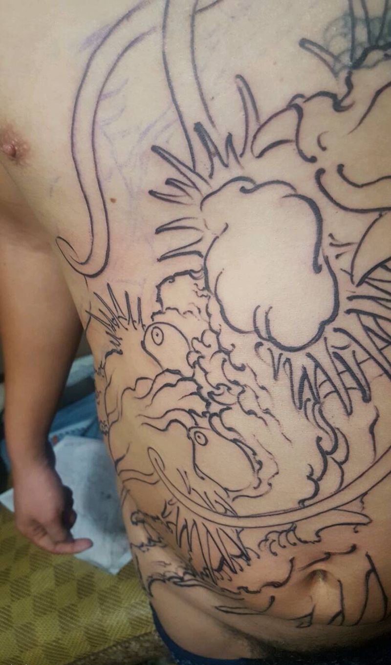 大浓纹身图片_胸部腿部传统鬼神纹身图案