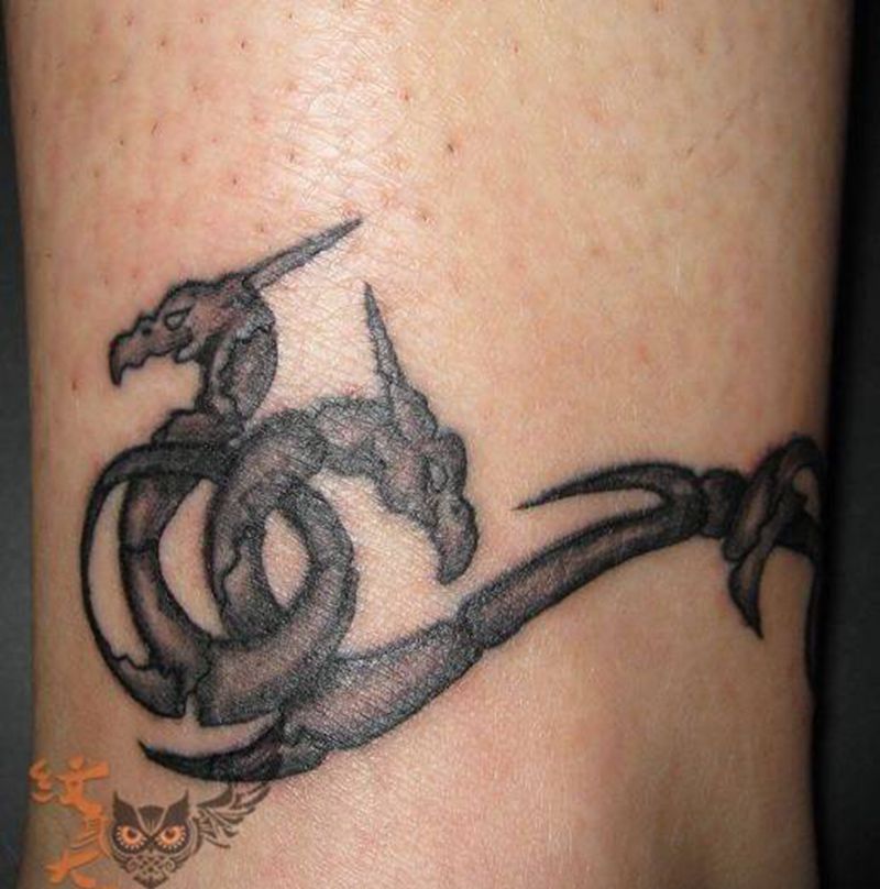 石雕双龙纹身图片_成品脚部欧美图腾纹身图案