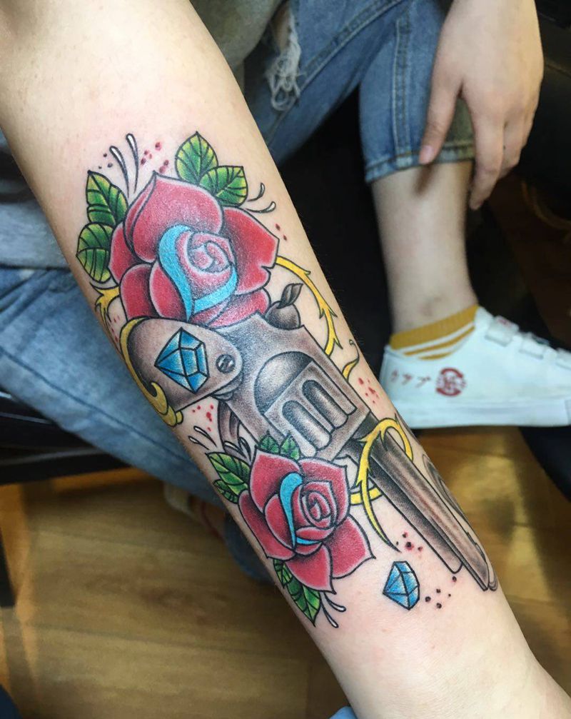 枪纹身图片_手臂纹身图案