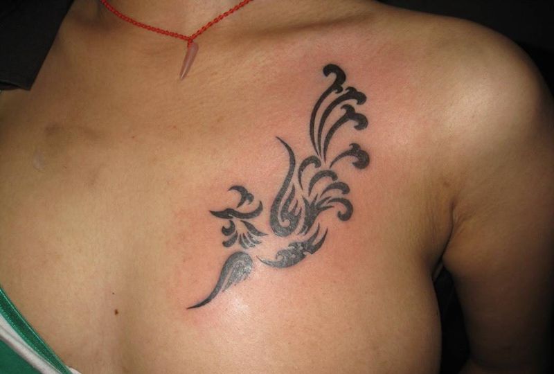 图腾凤凰纹身图片_成品胸部传统神兽图腾纹身图案