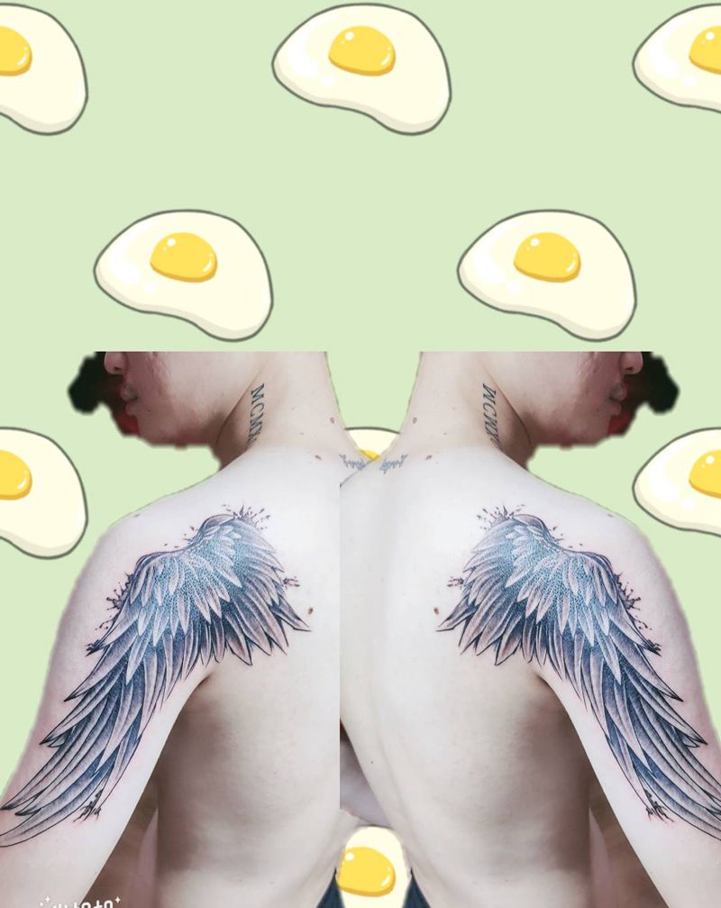 翅膀纹身图片_背部纹身图案