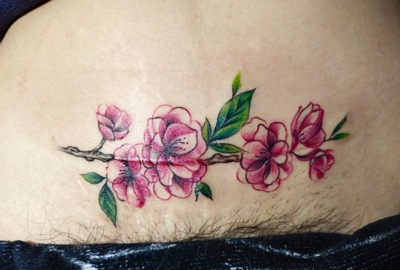 遮盖疤痕花纹身图片_腹部纹身图案