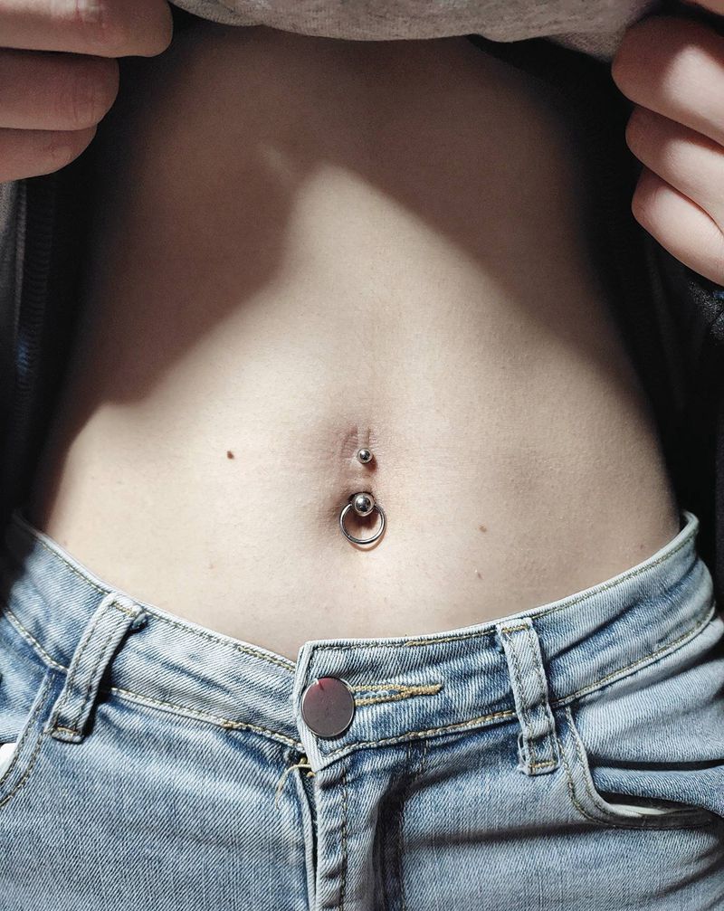 脐钉纹身图片_腹部纹身图案