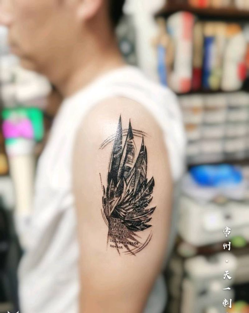 翅膀纹身图片_手臂点刺几何纹身图案
