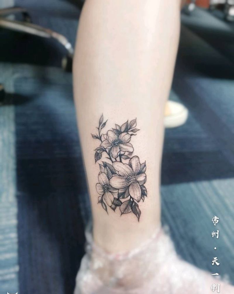 素花纹身图片_腿部点刺纹身图案