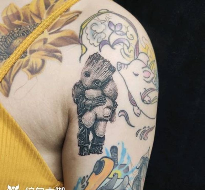 格鲁特纹身图片_手臂点刺纹身图案