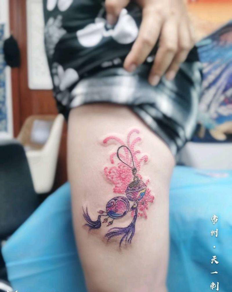 铃铛纹身图片_腿部水彩纹身图案