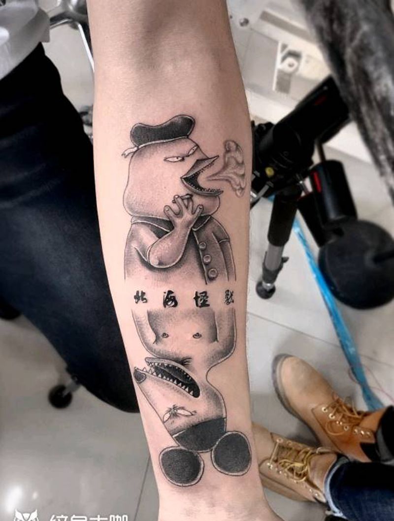 北海怪兽纹身图片_手臂点刺纹身图案