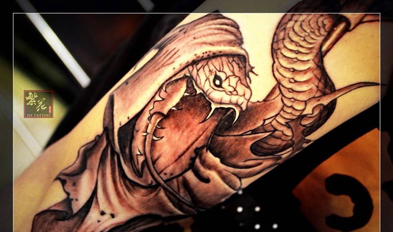 死神蛇,帅哥是妈妈陪着来纹身的哦纹身图片