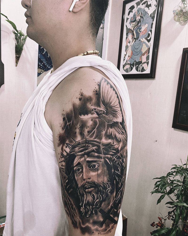 耶稣纹身图片_手臂纹身图案