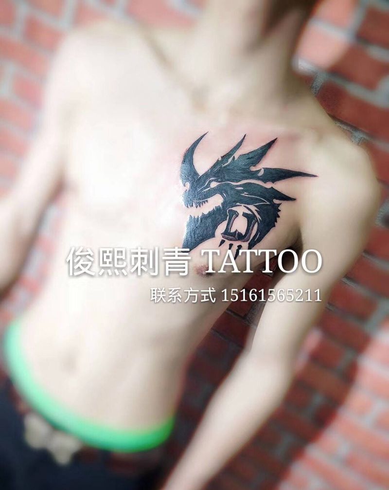 抽象龙头 字母纹身图片