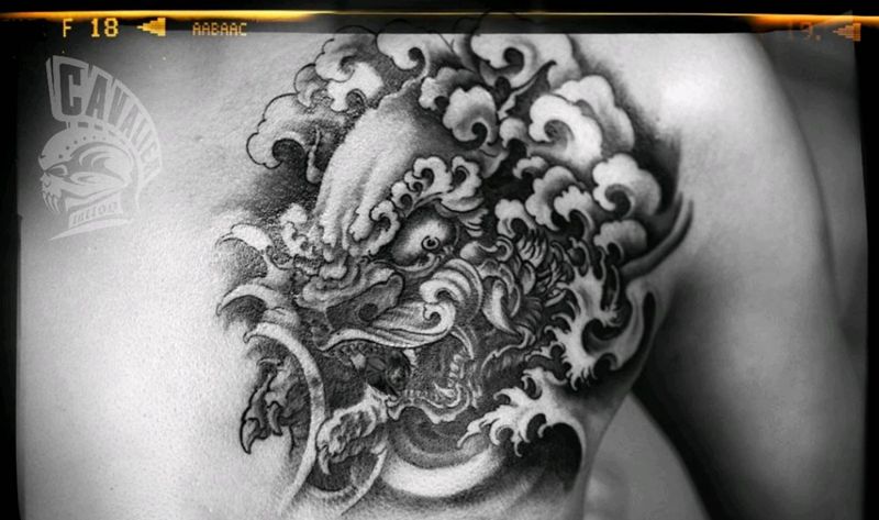 唐狮纹身图片_胸部新传统唐狮纹身图案