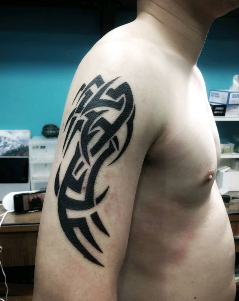 大臂图腾纹身图片_手臂图腾纹身图案