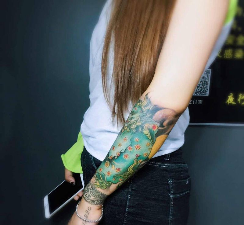 唐狮纹身图片_成品手臂传统鬼神纹身图案