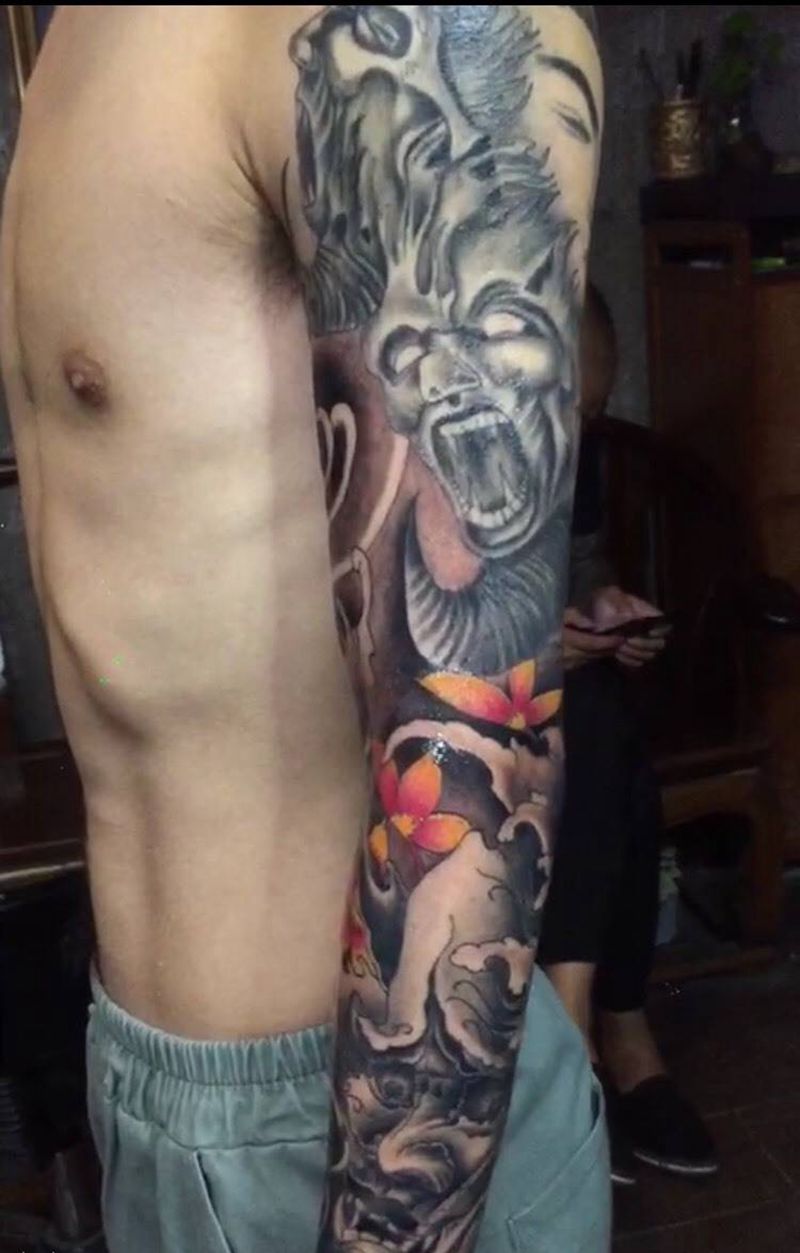 新传统花臂纹身图片_手臂背部新传统欧美写实纹身图案