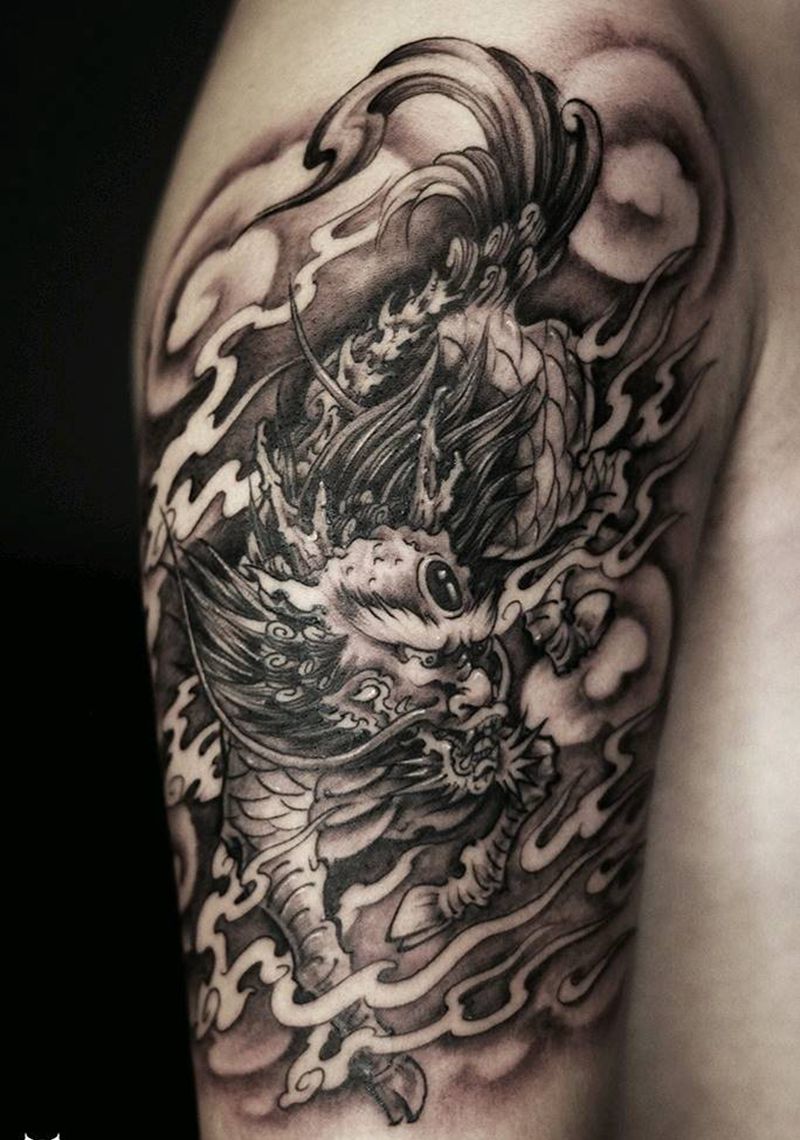 大臂麒麟纹身图片_手臂新传统纹身图案