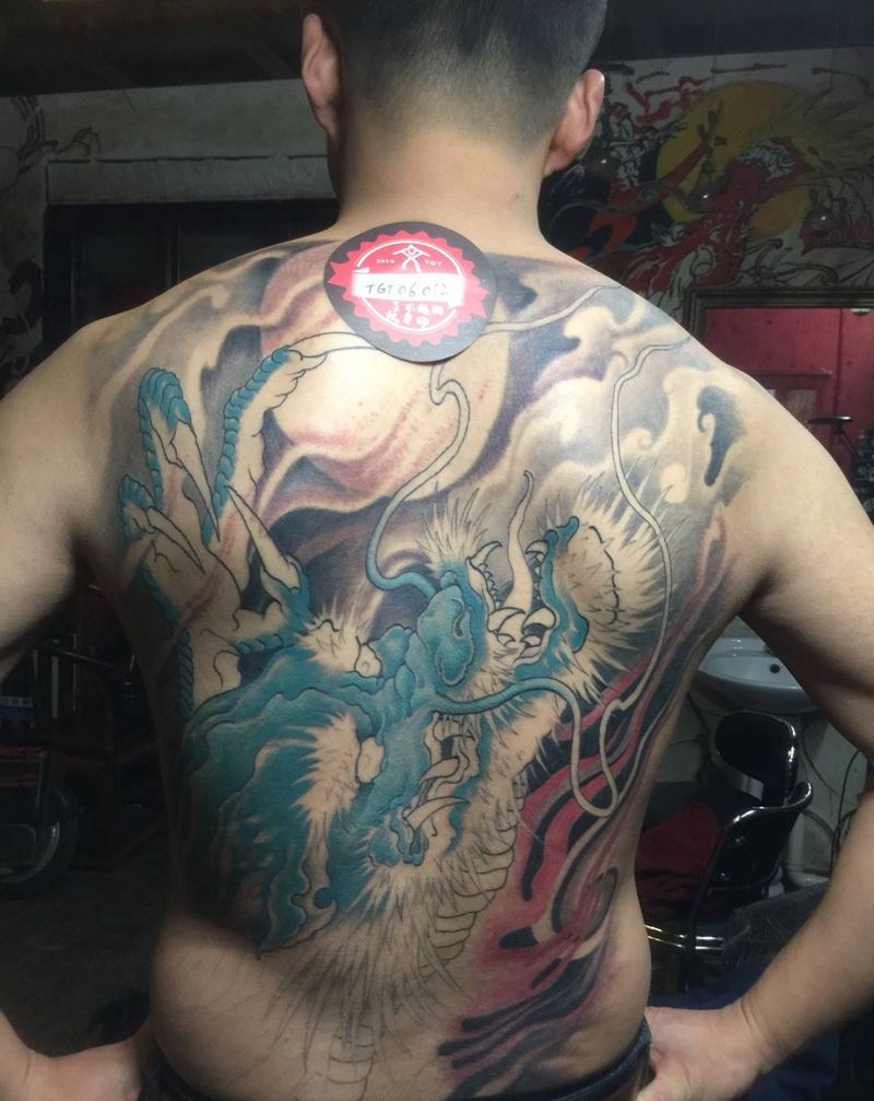 比赛纹身图片_背部手臂新传统纹身图案