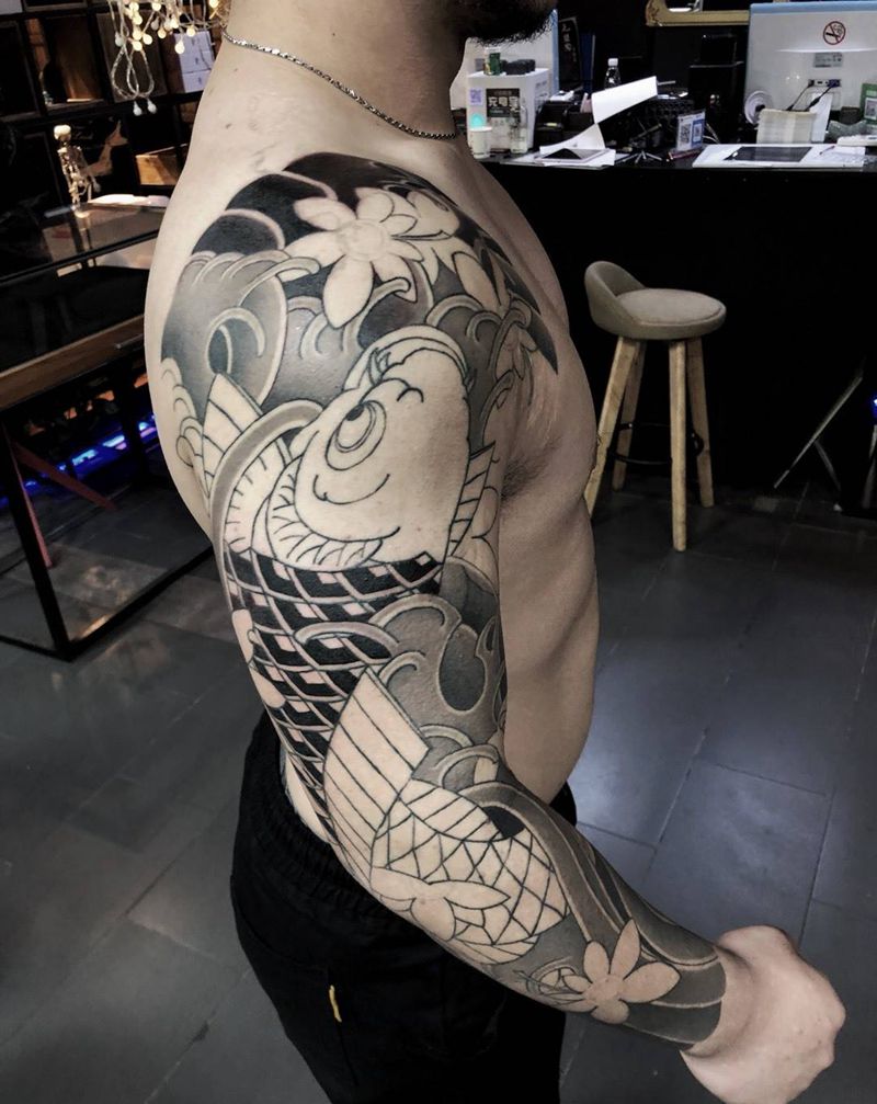 花臂鱼纹身图片