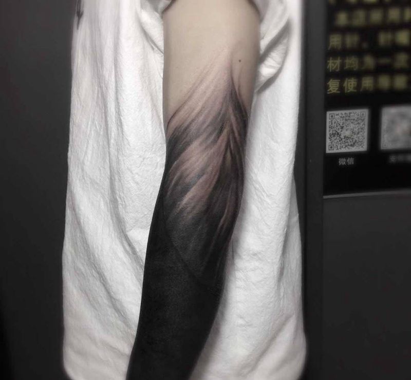 黑臂遮盖纹身图片