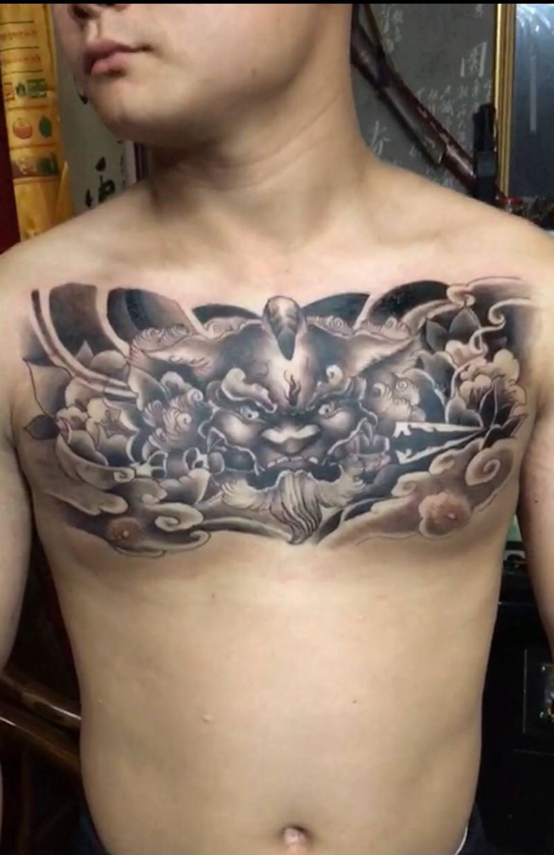 唐狮纹身图片_胸部新传统欧美写实纹身图案