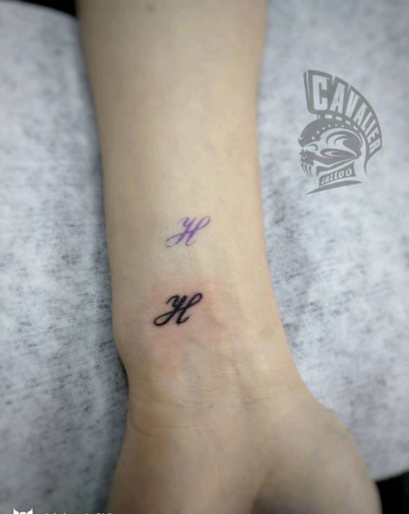 H纹身图片_手臂清新字符成品纹身图案