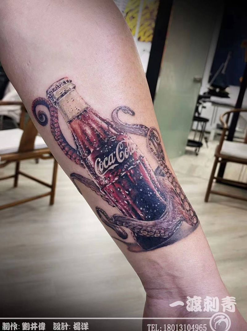 可乐纹身图片_手臂欧美写实纹身图案