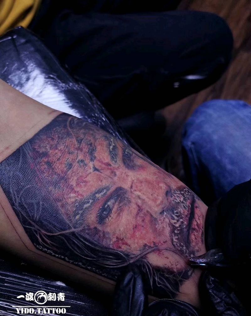 小李子纹身图片_手臂欧美写实纹身图案