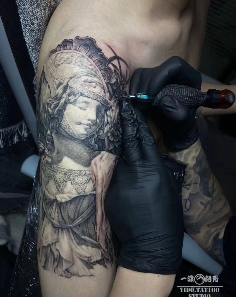 雕塑纹身图片_手臂欧美写实纹身图案