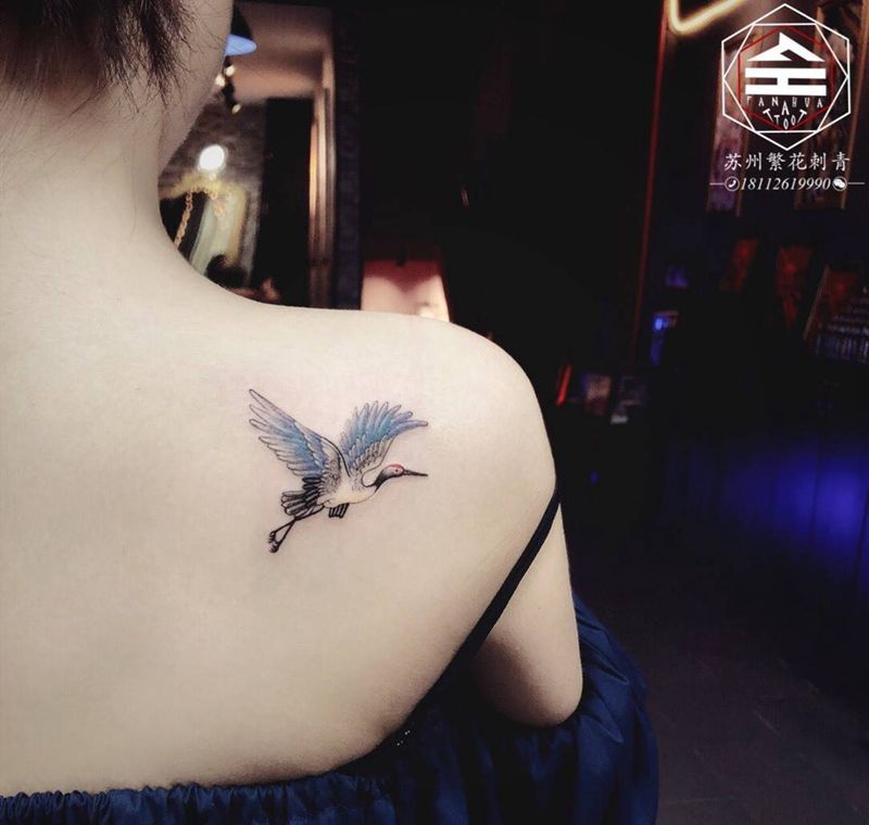 仙鹤与蝴蝶结纹身图片