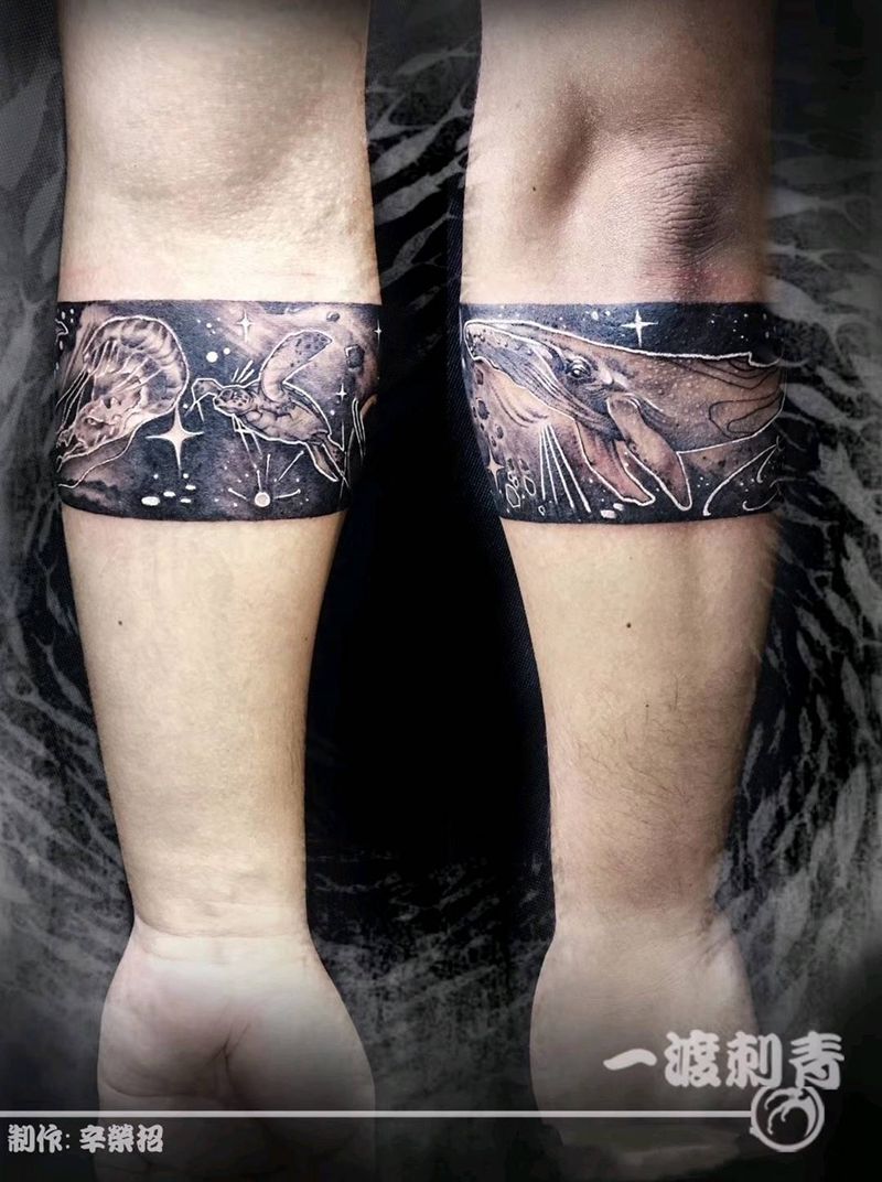 宇宙海洋臂环纹身图片_手臂点刺纹身图案