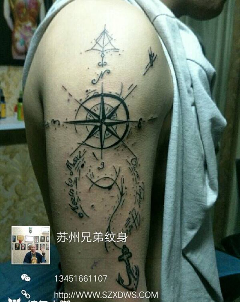 指南针纹身图片_手臂写实字符宗教成品纹身图案