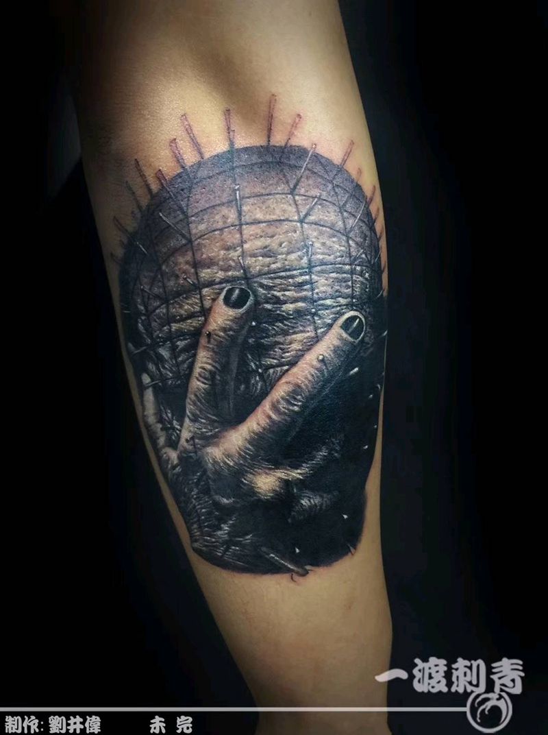 钉头人纹身图片_手臂欧美写实纹身图案