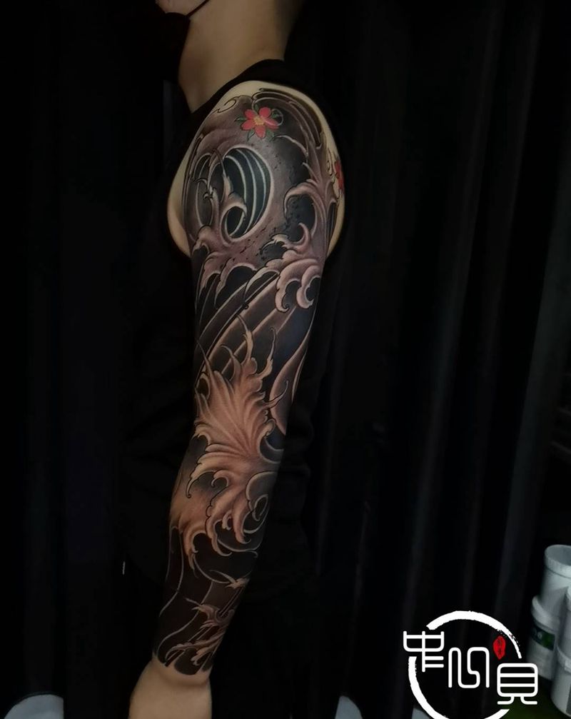 浪臂纹身图片_手臂纹身图案