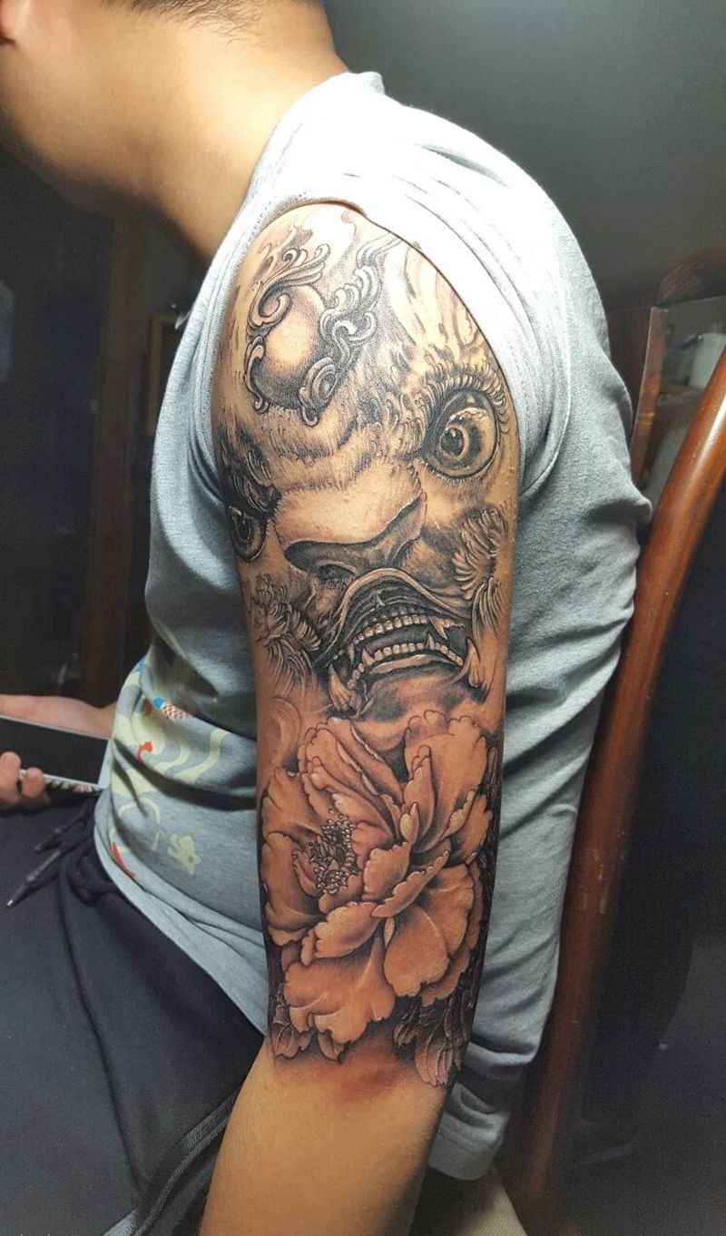 唐狮牡丹纹身图片_肩部传统国画动物宗教成品纹身图案