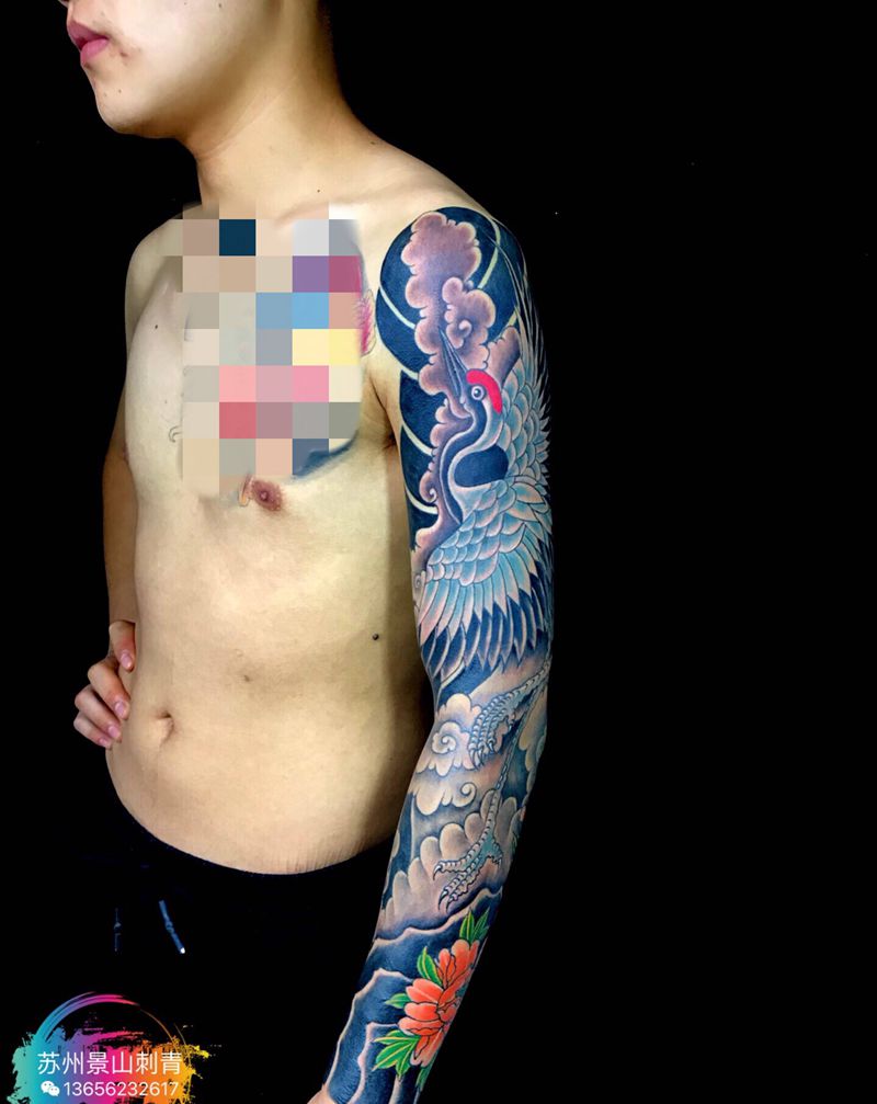 丹顶鹤牡丹花臂纹身图片