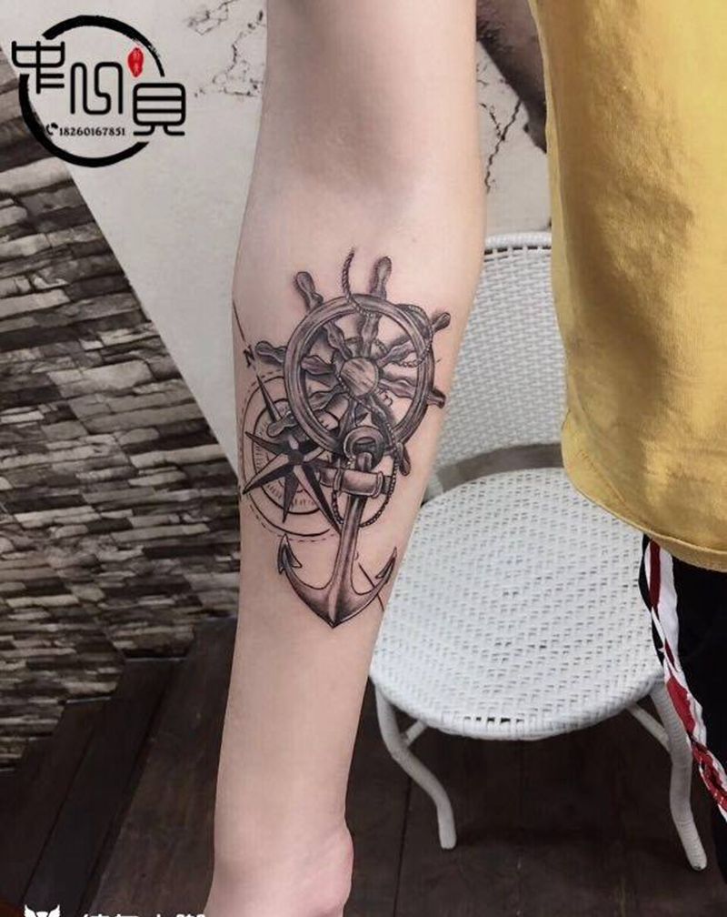 指南与舵纹身图片_手臂纹身图案