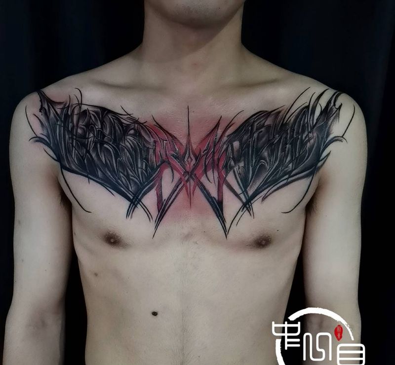 花体纹身图片_胸部纹身图案