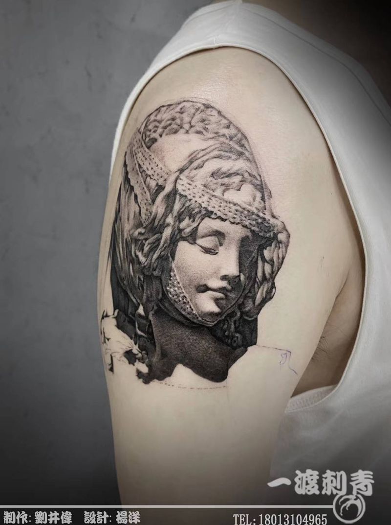 雕塑纹身图片_手臂欧美写实纹身图案