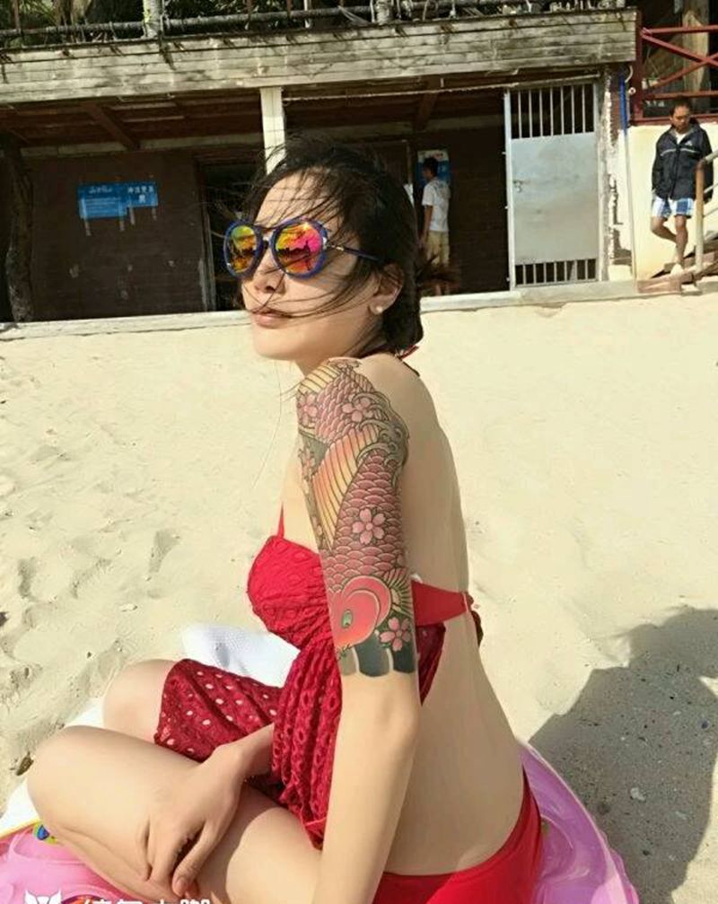 鯉魚櫻花~臺灣刺魔彫暉刺青纹身图片_手臂传统动物成品纹身图案