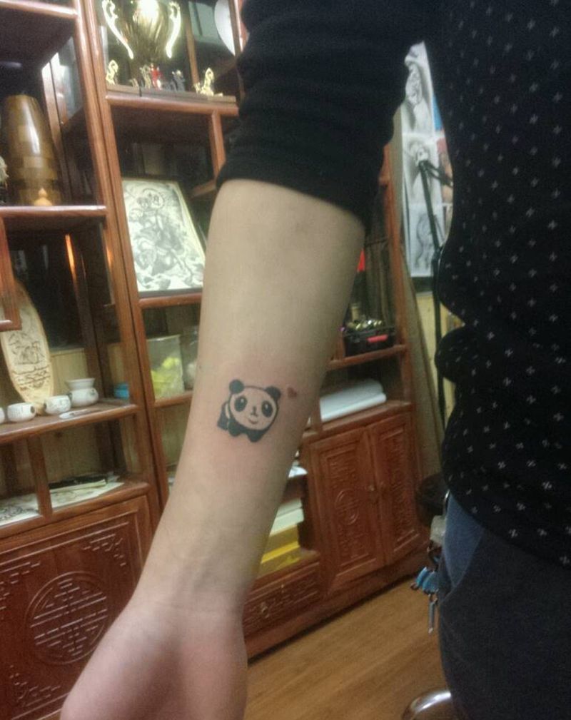 图腾小熊猫纹身图片_胸部手臂清新图腾纹身图案