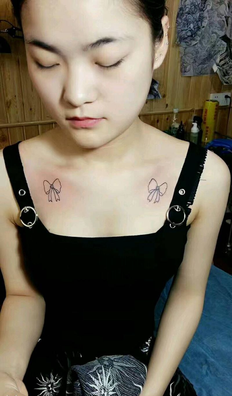 清新蝴蝶结纹身图片