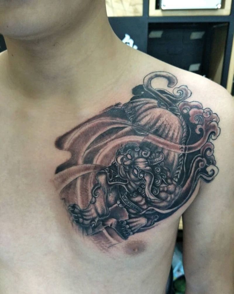 胸口碎大石纹身图片