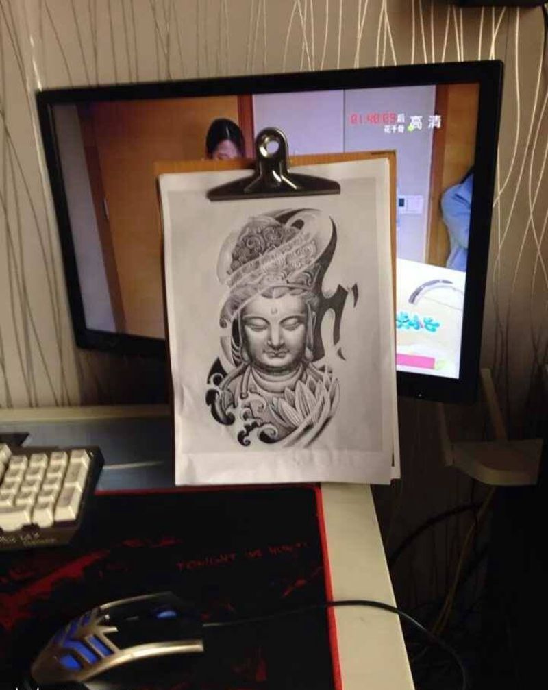 佛纹身图片_腿部传统肖像习俗人物成品纹身图案